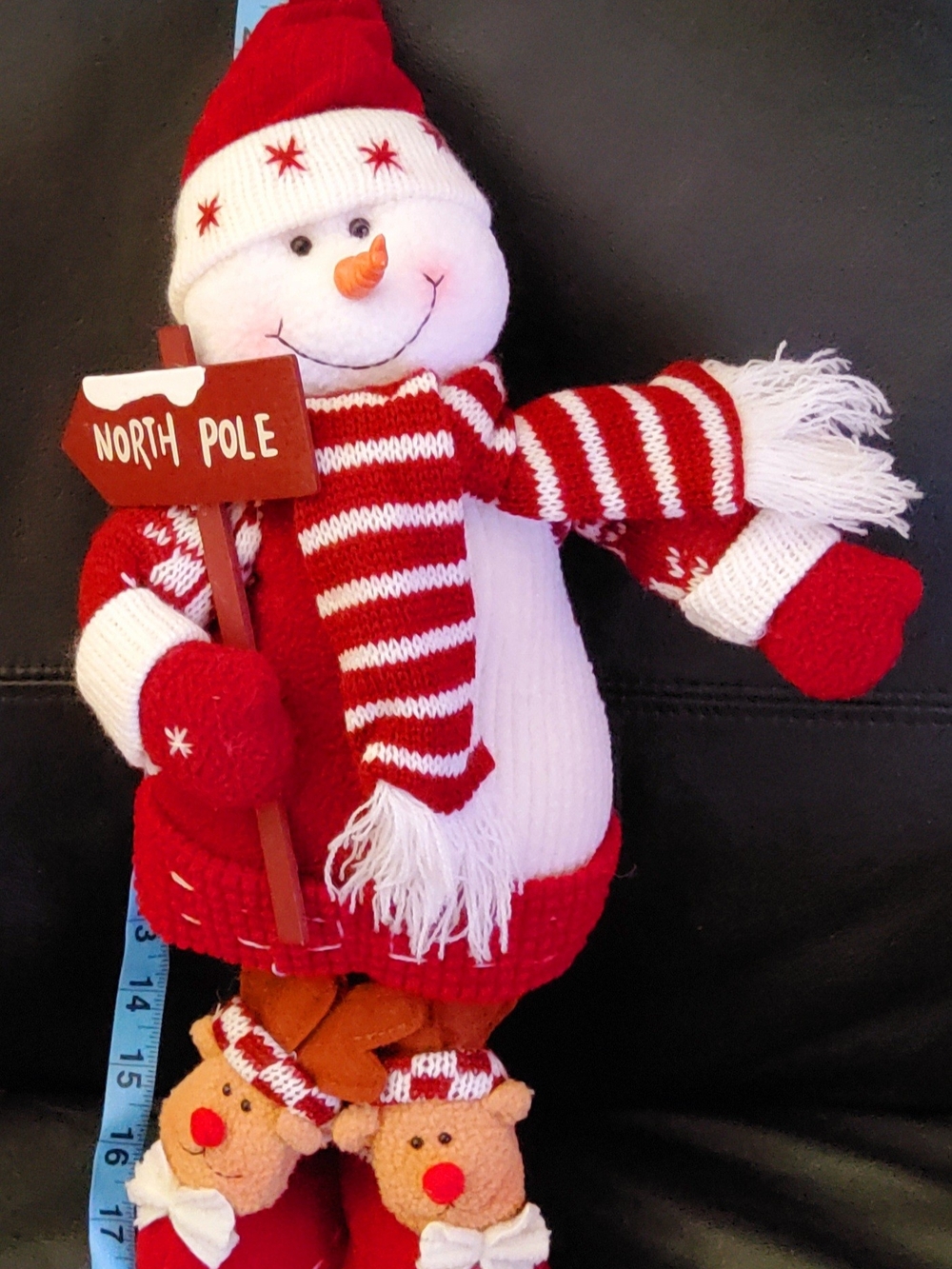 Red & White Knit Snowman Holding North Pole Sign